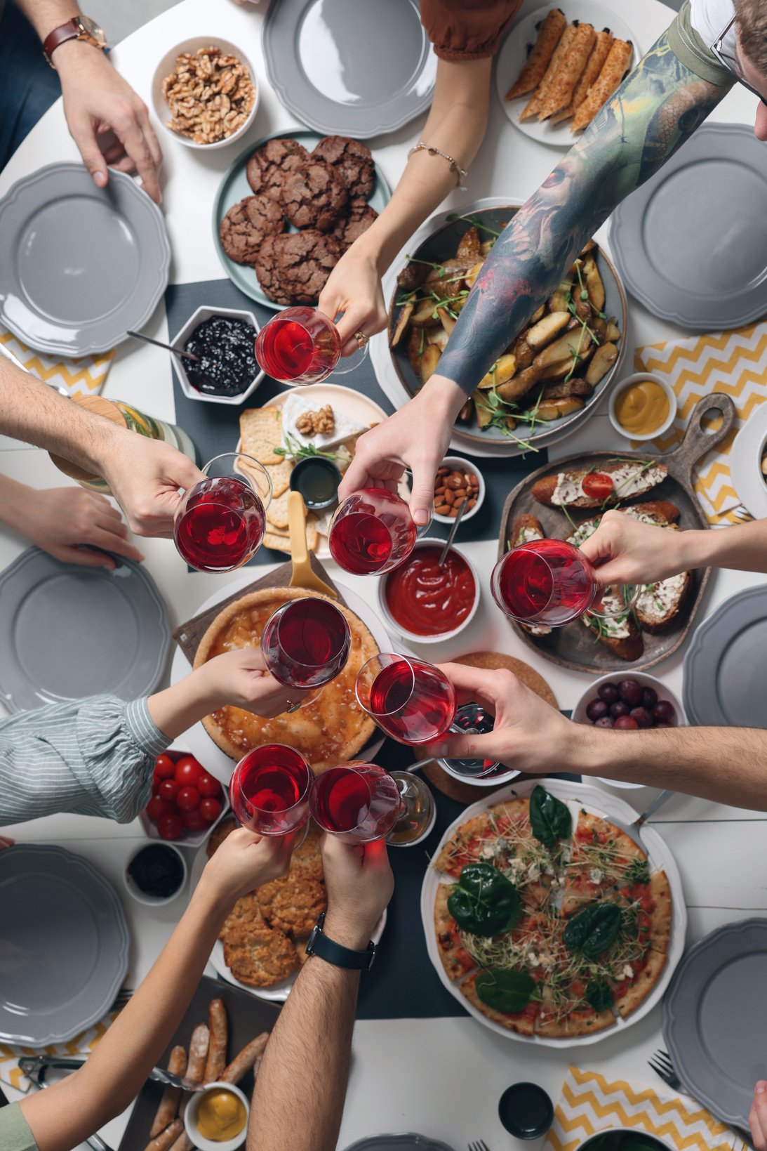 Group of People Having Brunch Together at Table, Top View